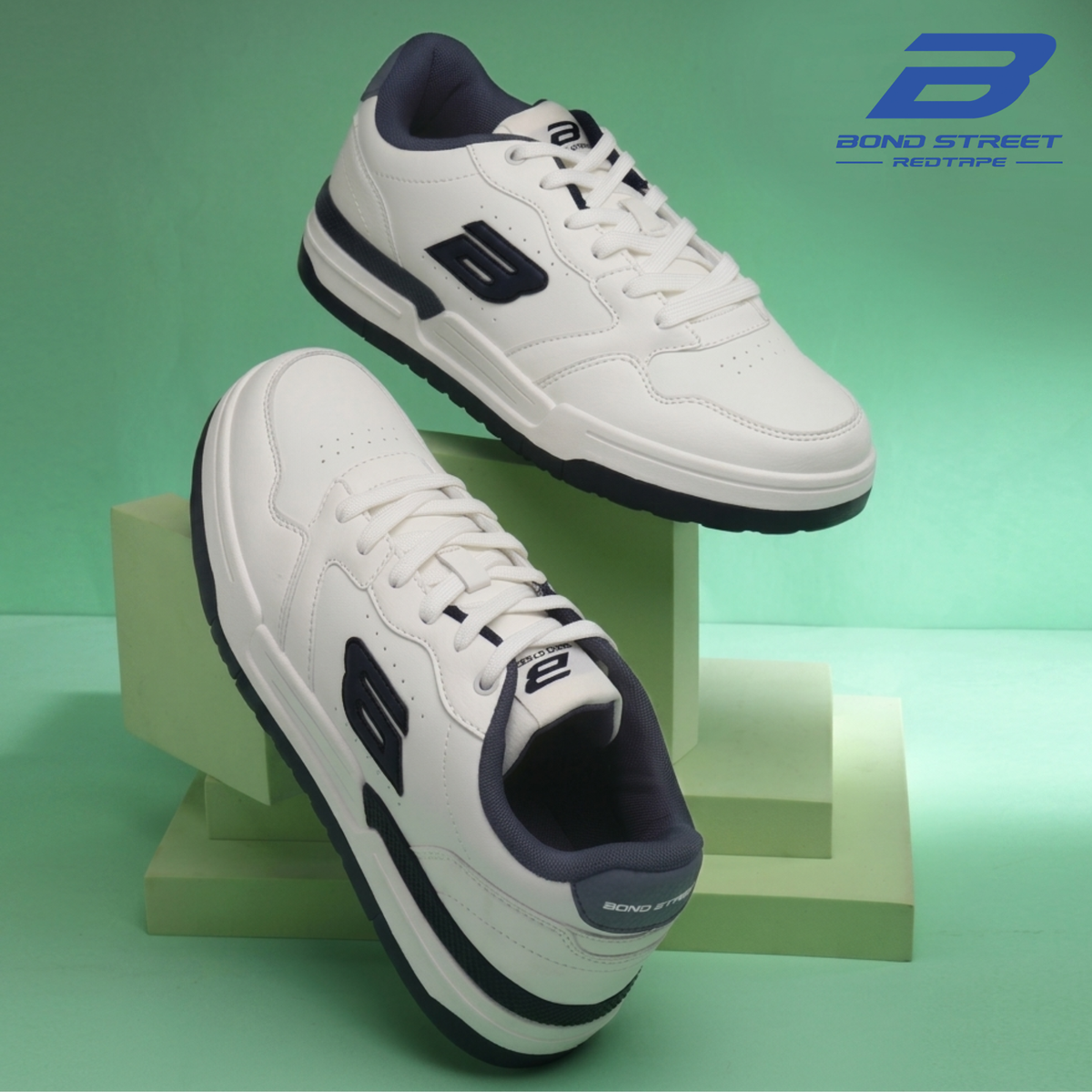 Bond Street Men's White and Blue Casual Sneakers — clean white base with blue accent detail, versatile everyday lace-up